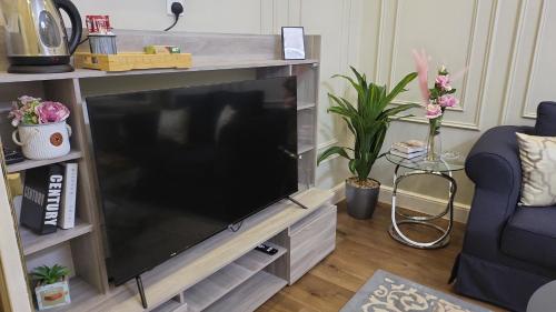 TV a/nebo společenská místnost v ubytování غرفة استديو مثالية جيزان