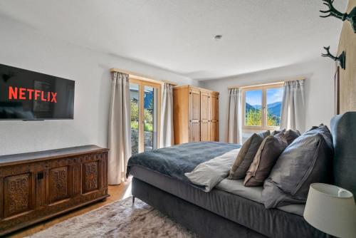Кровать или кровати в номере A&Y Chalet zum goldenen Hirsch