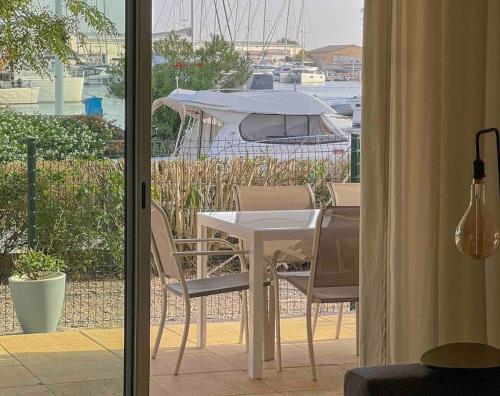 Face au bateaux, Neuf, 2 chambres , jardin