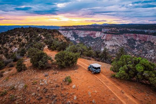 a truck on a dirt road in the grand canyon at Zion Ponderosa Ranch Resort in Springdale