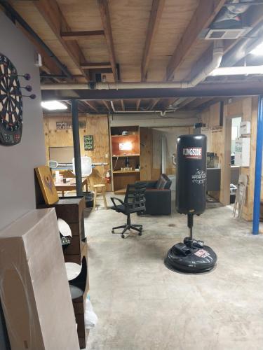 a room with a dart board on the wall at Commercial Loft in Kansas City