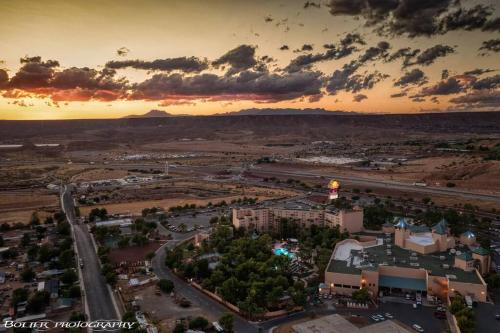 an aerial view of a city at sunset at Mesquite Retreat 2 Bd Condo by Cool Properties LLC in Mesquite