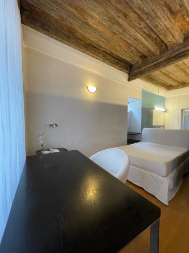 a bedroom with two beds and a table in it at Cozy Dachsberg in Krems an der Donau
