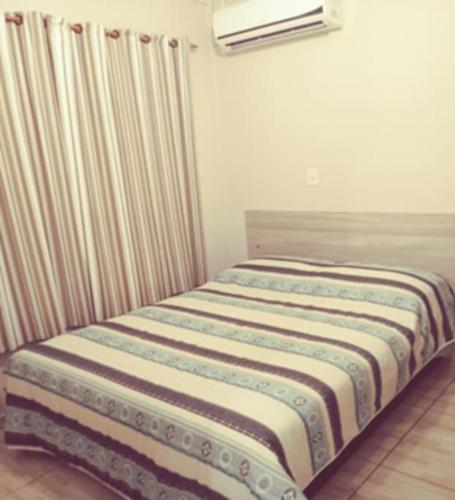 Ліжко або ліжка в номері Cabana 2 qts com ar-condicionado