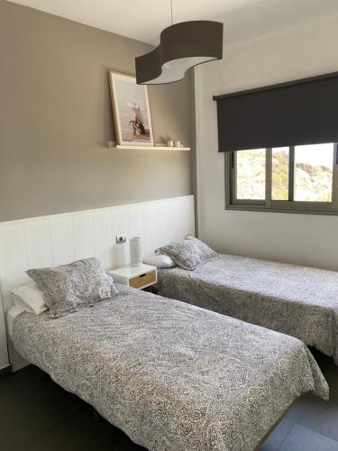 Postel nebo postele na pokoji v ubytování Casa La Picota