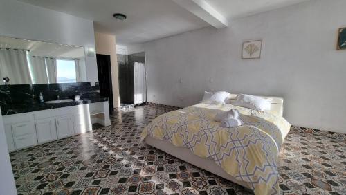 Ένα ή περισσότερα κρεβάτια σε δωμάτιο στο Oceanfront Serenity in Gated Community near Rosarito