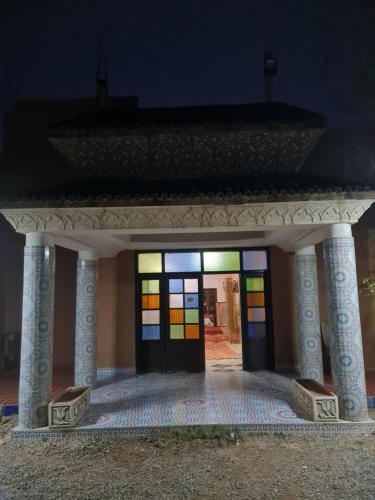 a lego house with a door with stained glass at Hôtel et Restaurant ARIJ in Midelt