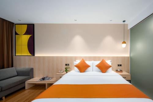 Postel nebo postele na pokoji v ubytování Shanshui Trends Hotel - Shatian Metro Station Longguang City