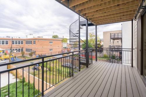 an empty balcony with a view of a street at Capitol View 3 Penthouse with Rooftop in Washington