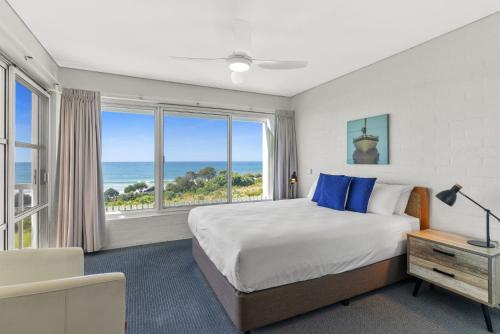 Postel nebo postele na pokoji v ubytování Quarterdeck 15