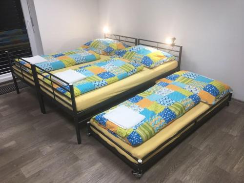 Postel nebo postele na pokoji v ubytování Ubytování U Jirky-Mutěnice