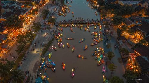 an overhead view of a city with christmas lights at Phuoc Dat Riverside Homestay Hoi An in Hoi An
