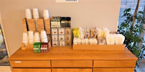 a counter top with a bunch of products on it at GRAND BASE Hiroshima Peace Memorial Park in Hiroshima