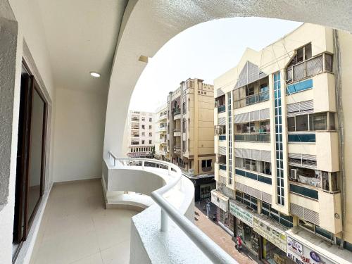 a view from the balcony of a building at Ras Star Residence - Home Stay in Dubai