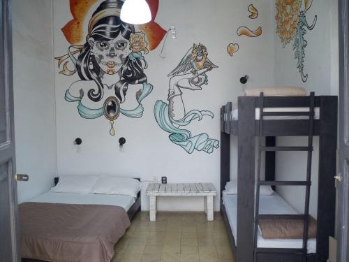 Postel nebo postele na pokoji v ubytování El Petate Hostel