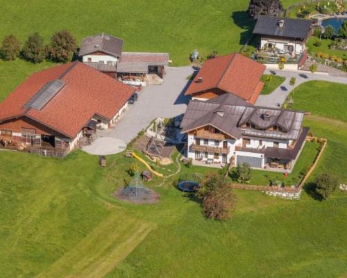 an aerial view of a large house at Stockhambauer in Kleinarl