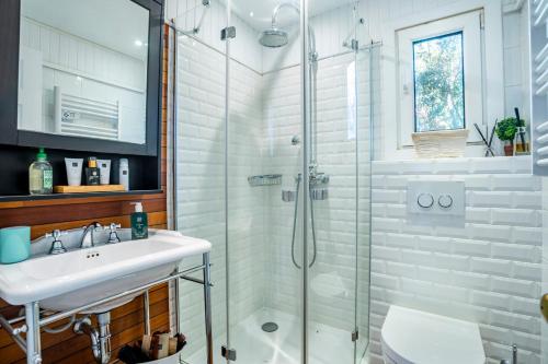 a bathroom with a sink and a shower at Casa Bambou An hidden gem near Saint Tropez with private pool in Gassin