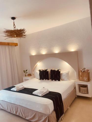 Postel nebo postele na pokoji v ubytování VR CLUB Tulum Riviera