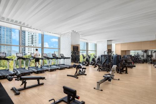 a gym with a lot of treadmills and machines at Shangri-La Nanjing in Nanjing