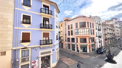an overhead view of a blue building on a city street at Cervantes Prime in Valencia