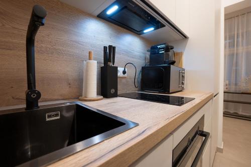 Stylish central 1-bedroom apartment with a terrace