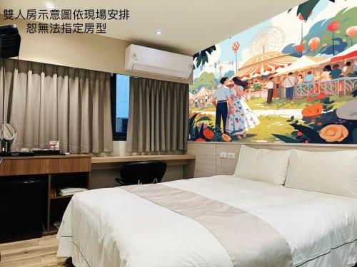 a bedroom with a bed and a large painting on the wall at Dazz Inn in Taichung