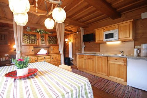 a kitchen with a table with a plate on it at Almliesl GAST-462 in Bad Hofgastein