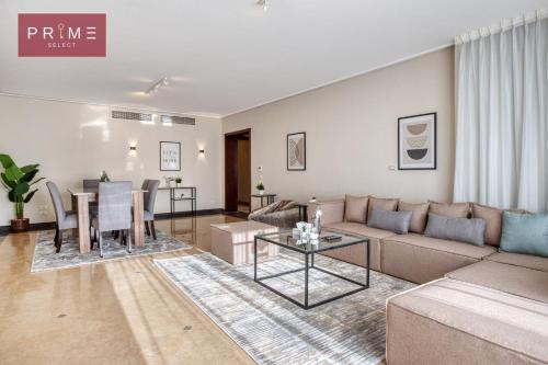 a living room with a couch and a table at Prime Select New Giza in Giza