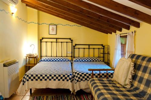 Ένα ή περισσότερα κρεβάτια σε δωμάτιο στο Casa Manadero