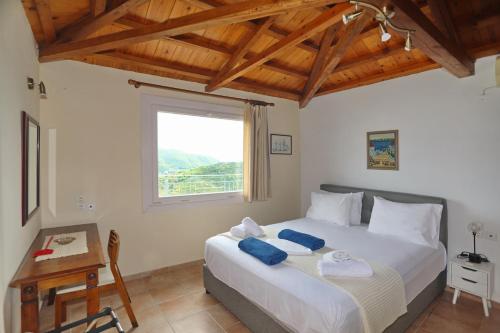Ένα ή περισσότερα κρεβάτια σε δωμάτιο στο Villa Margarita