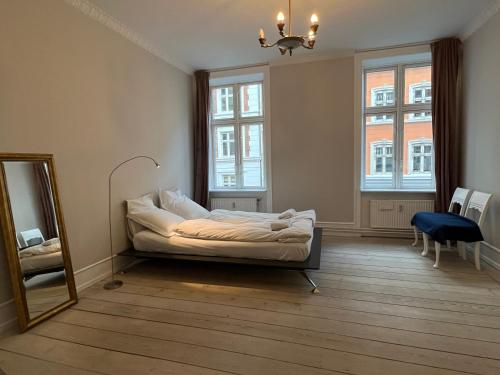 Postel nebo postele na pokoji v ubytování Historical appartment