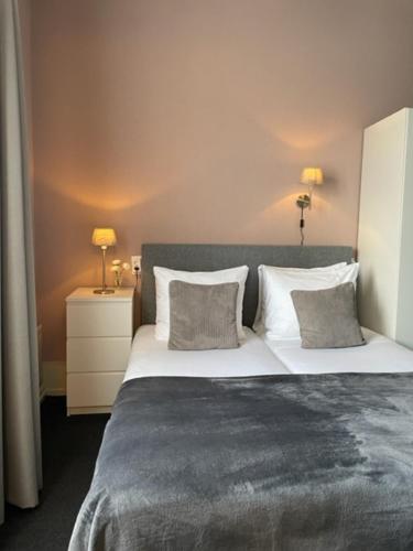 Кровать или кровати в номере Hotel De la Ruïne