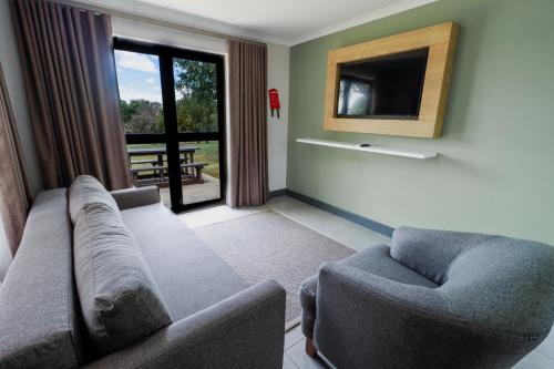 TV a/nebo společenská místnost v ubytování Emerald Resort & Casino