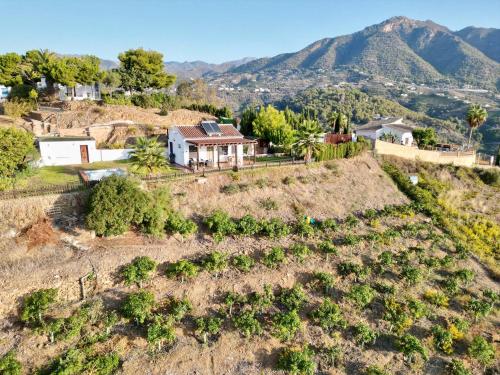 an aerial view of a house on a hill at Vela Luka Frigiliana in Frigiliana