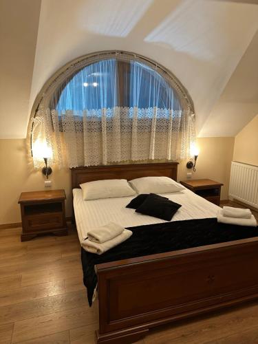 Katil atau katil-katil dalam bilik di Restauracja i Hotel Oberża Wilczy Głód