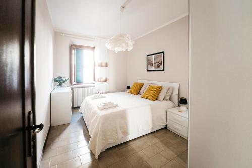 Postel nebo postele na pokoji v ubytování Casa Alice Lucca centro