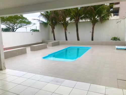 Bazén v ubytování Casa Beira Mar em Guaratuba nebo v jeho okolí