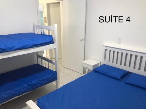 Postel nebo postele na pokoji v ubytování Casa Beira Mar em Guaratuba