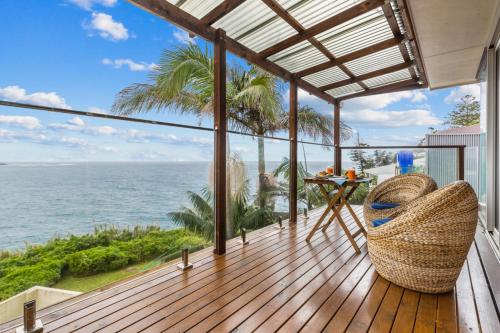 a balcony with a view of the ocean at Magical views of dee why in Deewhy