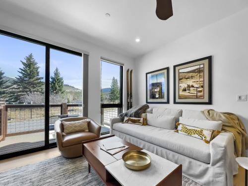 a living room with a couch and a table at 541 Center Circle 3Br 3,5Ba townhouse in Silverthorne