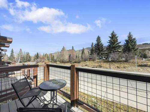 a balcony with a table and chairs and a view at 541 Center Circle 3Br 3,5Ba townhouse in Silverthorne