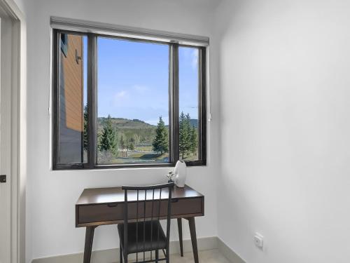 a desk in a room with a window at 541 Center Circle 3Br 3,5Ba townhouse in Silverthorne