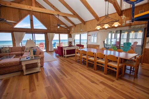 a living room with a table and a couch at OCEANFRONT, Ocean views, Quiet area, SA183, Ocean Island in Sanderling