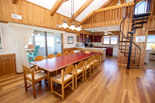a kitchen and dining room with a table and chairs at OCEANFRONT, Ocean views, Quiet area, SA183, Ocean Island in Sanderling