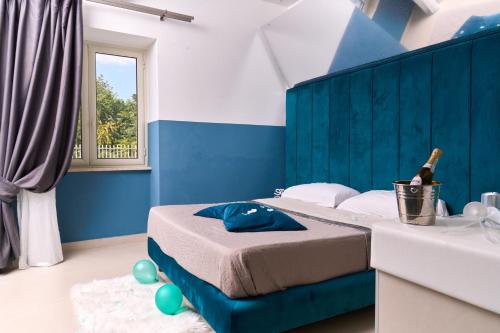 Postel nebo postele na pokoji v ubytování Hotel Melydà