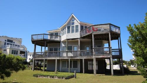 a large house with balconies on top of it at Oceanside, Private Pool, Community Pool, Sun Deck, SP8, Ole Duck Haven in Duck
