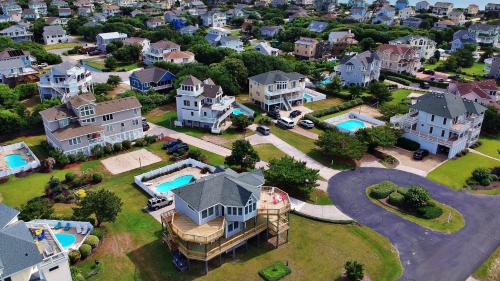 an aerial view of a large estate with houses at Oceanside, Private Pool, Community Pool, Sun Deck, SP8, Ole Duck Haven in Duck
