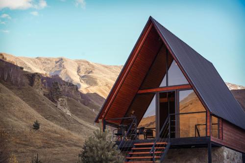 a cabin in the mountains with a view at Gagma chalets in Kazbegi