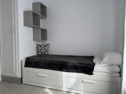 Ένα ή περισσότερα κρεβάτια σε δωμάτιο στο Parque Santiago II , renovated, ocean view, heated swimming pool !