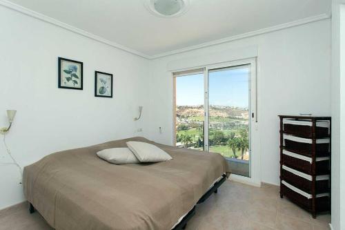 Katil atau katil-katil dalam bilik di CH Casa Marco Simone La Marquesa Golf (Ciudad Quesada)